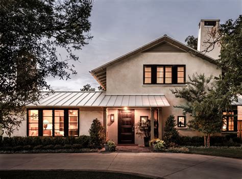 modern house with stucco and corrugated metal|metal roofed stucco homes.